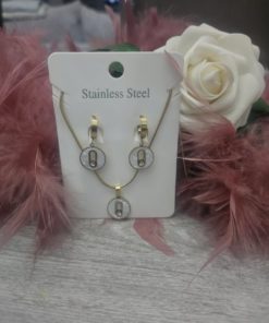 Dormeuses et collier doré blanc strass